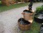 Preview: Kleine Holzfass Cascade mit Wasserspiel als Gartendeko und Pumpfass Brunnen für Badespaß